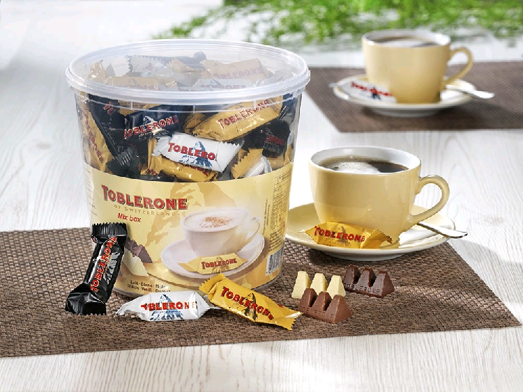 Toblerone Mini-Mix, Schokolade, Inhalt: 113 Stück à 8 g je Runddose.